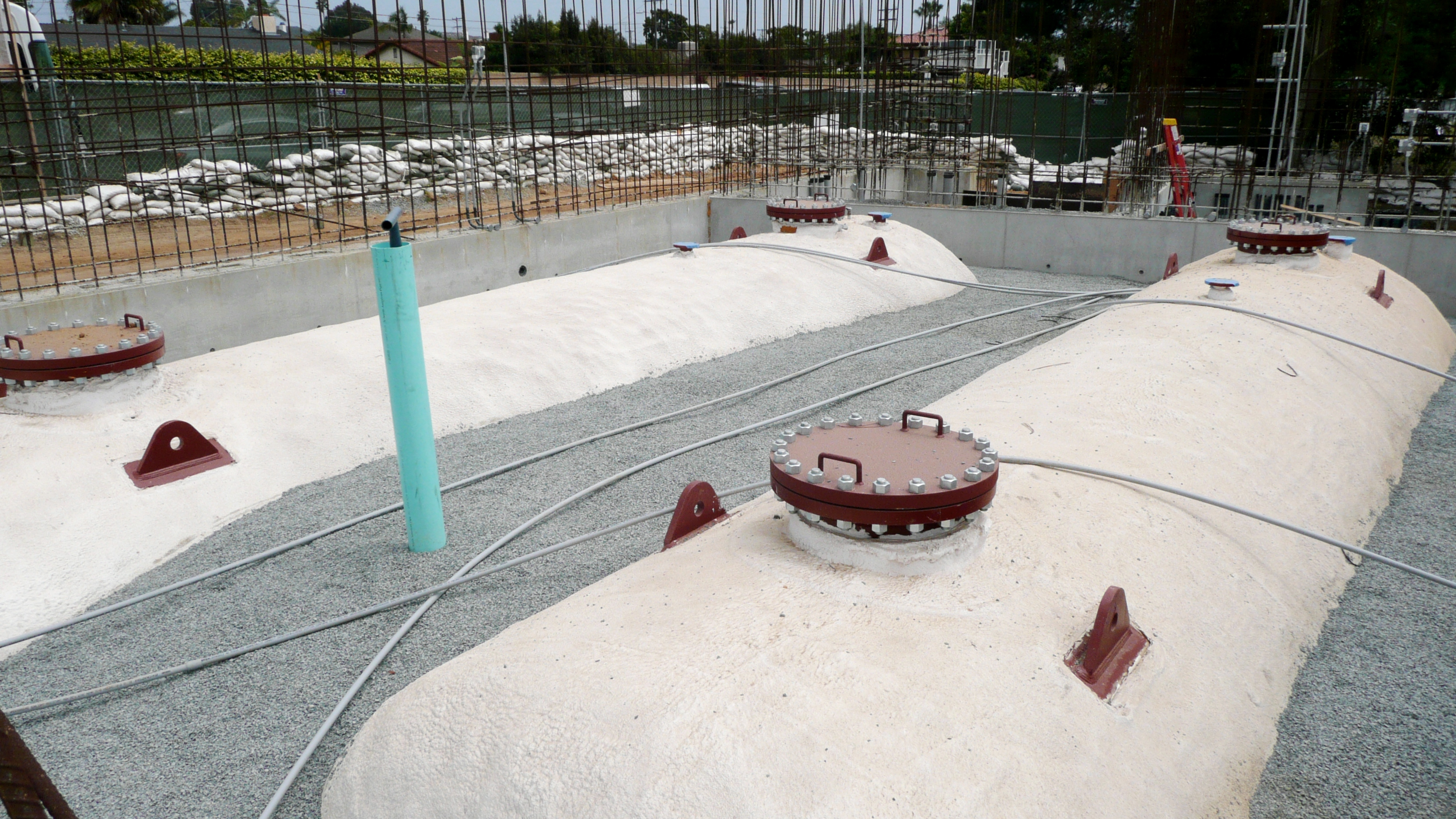 Two 25,000 gallon TES tanks being installed